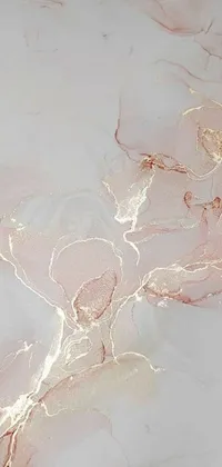 This phone live wallpaper showcases a stunning close up view of a marble surface with intricate baroque-inspired detailing