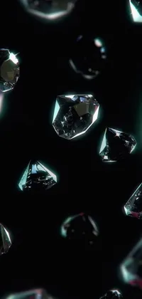 This phone live wallpaper features a digital art design with a bunch of diamonds on a black surface
