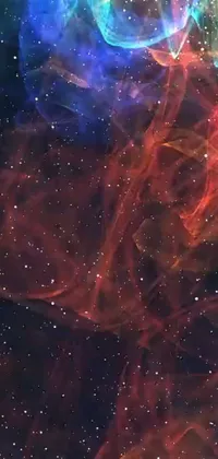 This space-themed live wallpaper features a modern cell phone against a backdrop of a stunning red nebula and the structure of the galaxy