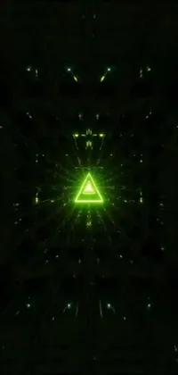 This phone live wallpaper boasts a mesmerizing holographic green triangle set in a dark room