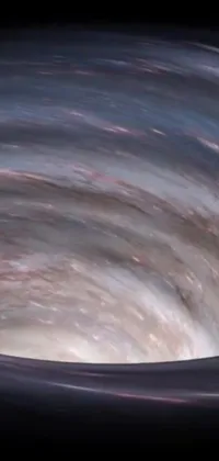 Transform your phone screen with a breathtaking spiral at the center of a black hole in this live wallpaper