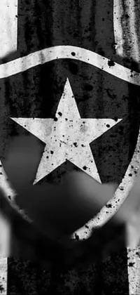 This phone live wallpaper features a striking black and white photo of a shield with a star, exuding a sense of protection and security