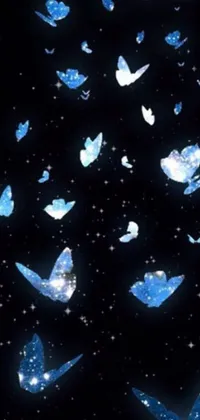 This stunning phone live wallpaper showcases a beautiful collection of blue butterflies soaring gracefully through the air in a digital art style