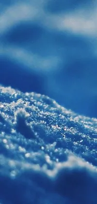 Experience the magic of the winter wonderland right on your phone screen with this stunning live wallpaper