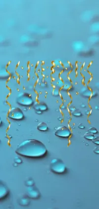 Looking for a beautiful live wallpaper for your phone? Check out this stunning generative art wallpaper featuring a mesmerizing close-up of water droplets on a blue background, with a breathtaking golden rain in the backdrop