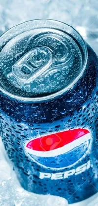 Looking for a refreshing live wallpaper for your phone? Check out this amazing Pepsi wallpaper! Featuring a can of Pepsi on top of a bed of ice, this high-quality image is perfect for those looking to add a realistic touch to their device