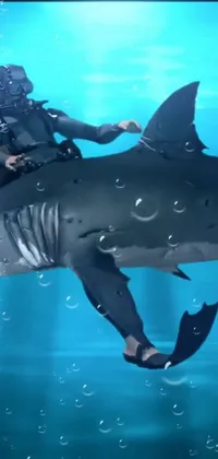 This striking phone live wallpaper features a man riding a hyper-realistic shark in the ocean