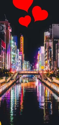 Looking for an awe-inspiring phone wallpaper? This live wallpaper will take your breath away! An enchanting river runs through a busy urban city at night, complete with glowing neon signs and colorful lights