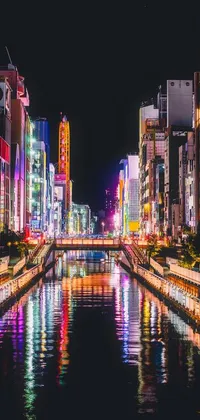 This phone live wallpaper showcases a stunning cityscape at night, with a flowing river that reflects illuminated buildings and creates a dramatic visual effect