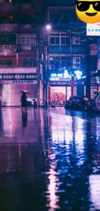 This phone live wallpaper features a stunning cyberpunk-inspired art style depicting a lone figure walking in the rain with an umbrella