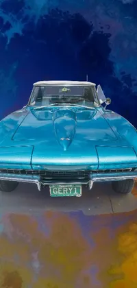 This live wallpaper depicts a painting of a blue Corvette C2 1969 against a backdrop of white fluffy clouds