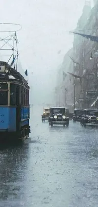 Looking for a vintage and unique live wallpaper for your phone? Check out this colorized photo by Artur Tarnowski on Tumblr featuring two trolleys driving down a city street in the rain
