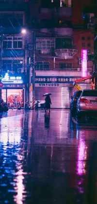 This phone live wallpaper showcases a neon noir cyberpunk scene of a person walking in the rain with an umbrella