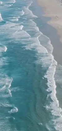 This live wallpaper features a breathtaking aerial shot of a picturesque shoreline and a vast body of water