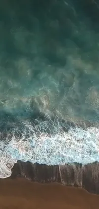 Experience the thrill of surfing with this stunning phone live wallpaper