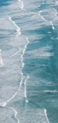 Enjoy the thrill of surfing with this live wallpaper