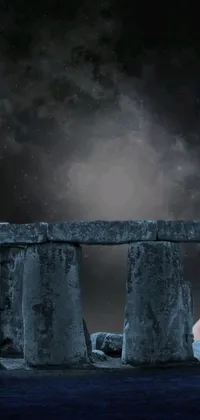 This live wallpaper depicts the Stonehenge with a full moon in the background, featuring stunning digital art that creates an abstract and mystical bridge between the worlds