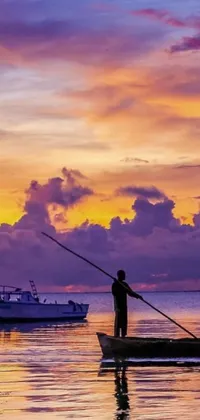 This is a stunning live wallpaper for your phone, featuring an image of a man standing confidently on a boat with a gorgeous body of water in the background