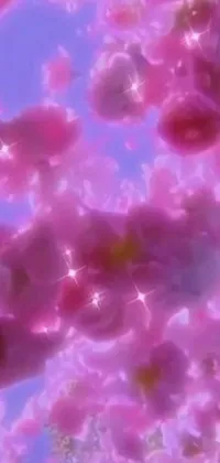 This vibrant phone live wallpaper showcases a colorful digital artwork, featuring a bunch of pink flowers set against a stunning blue sky, with a glitter GIF effect adding a touch of sparkle
