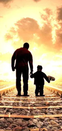 This phone live wallpaper is a beautiful, heartwarming scene of a man and child walking down a train track together