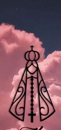 This phone live wallpaper showcases a stunning image of a cross on a cloud with the moon in the background