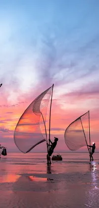 Fishing nets on sea against sundown sky · Free Stock Photo