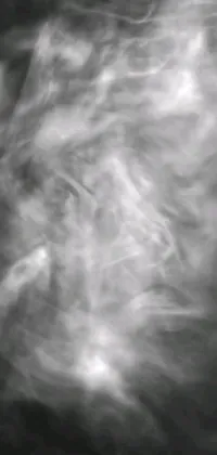This black and white live phone wallpaper features an otherworldly image of swirling smoke