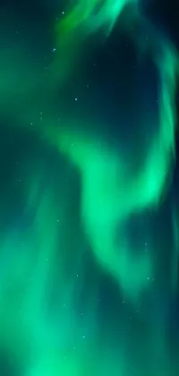 Enjoy a stunning display of the aurora borealis on your phone's wallpaper