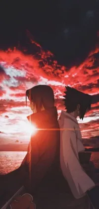 This captivating live wallpaper displays a couple standing together in front of a stunning sunset