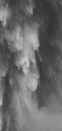 This live phone wallpaper features a high-resolution black and white photo of a large cloud inside a waterfall, creating an immersive visual experience with dynamic movement simulation