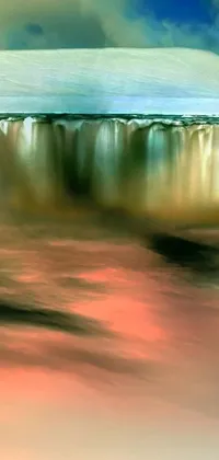 This live wallpaper brings the beauty of nature to your phone with a stunning digital painting of a large waterfall