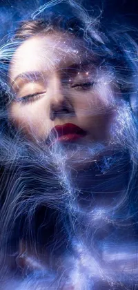 This stunning phone live wallpaper features a digitally created image of a woman with closed eyes and flowing hair