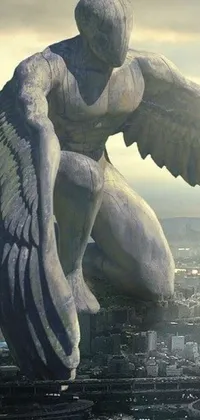 This phone live wallpaper showcases a magnificent angel statue flying over a bustling city