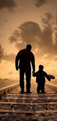 This live wallpaper features a heartwarming visual of a man and child walking on a train track
