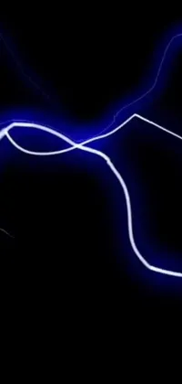 Looking for an electrifying live wallpaper for your phone? Look no further than this stunning digital rendering of lightning! Created by a talented digital artist, this wallpaper features thick wires and thin blue arteries pulsing with electricity against a black background