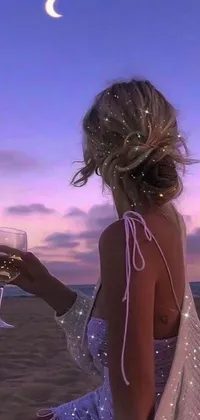 This phone live wallpaper features a digital art design of a woman on a beach holding a glass of wine