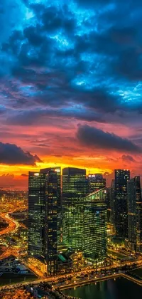 This phone live wallpaper features a stunning aerial view of a city at sunset in Singapore