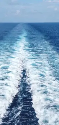 Check out this stunning phone live wallpaper featuring a large body of water located in the middle of a vast ocean