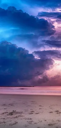 This lively live wallpaper depicts a surfer riding the waves on a sandy beach under a vibrant pink and blue sky, electrified by thunderstorm lightning