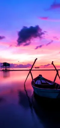 Experience a visually stunning live wallpaper for your phone! Featuring a serene boat floating atop a shimmering body of water with a breathtaking violet and yellow sunset in the background