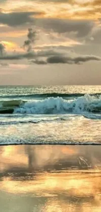This live wallpaper features a man surfing on a sandy beach in Sri Lanka during a beautiful golden morning
