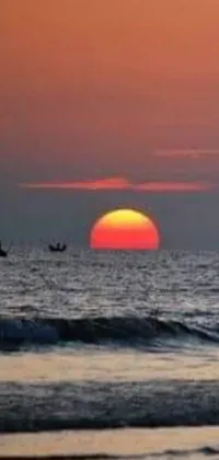 Looking to add some serene beauty to your phone? Check out this live wallpaper featuring a breathtaking sunset over the ocean horizon in Guwahati! The warm and inviting colors of the setting sun reflect in the gentle waves of the sea, creating an unforgettable image that is sure to calm and inspire