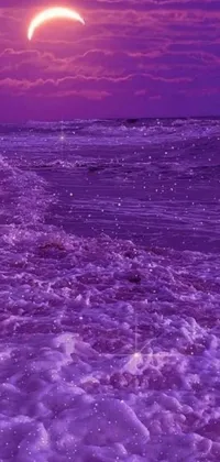This stunning phone live wallpaper showcases a soft, purple sunset casting a calming glow over a glittering body of water