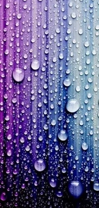 Get lost in the beauty of heavily raining droplets with this Live Wallpaper