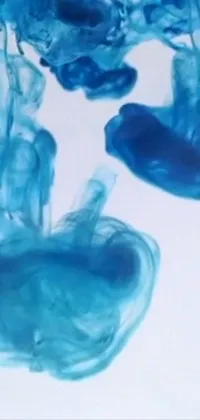 This dynamic phone live wallpaper captures the intricacies of blue ink blending and separating in water