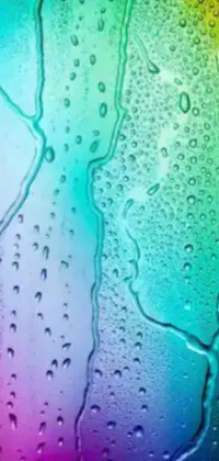 Add colour and movement to your phone with this close-up live wallpaper of water droplets on a window
