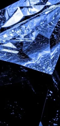 Experience the elegance of crystal cubism with this stunning blue diamond live wallpaper