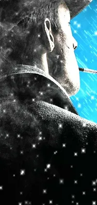 This snow-themed phone live wallpaper depicts a man smoking in a visually stunning scene