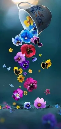 This stunning phone live wallpaper features a breathtaking scene of colorful flowers flying in the air