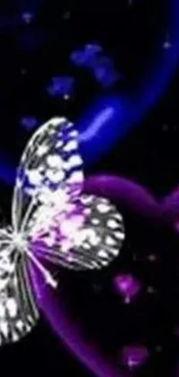 The stunning live wallpaper for your phone features a sublime butterfly resting delicately on top of a regal purple heart